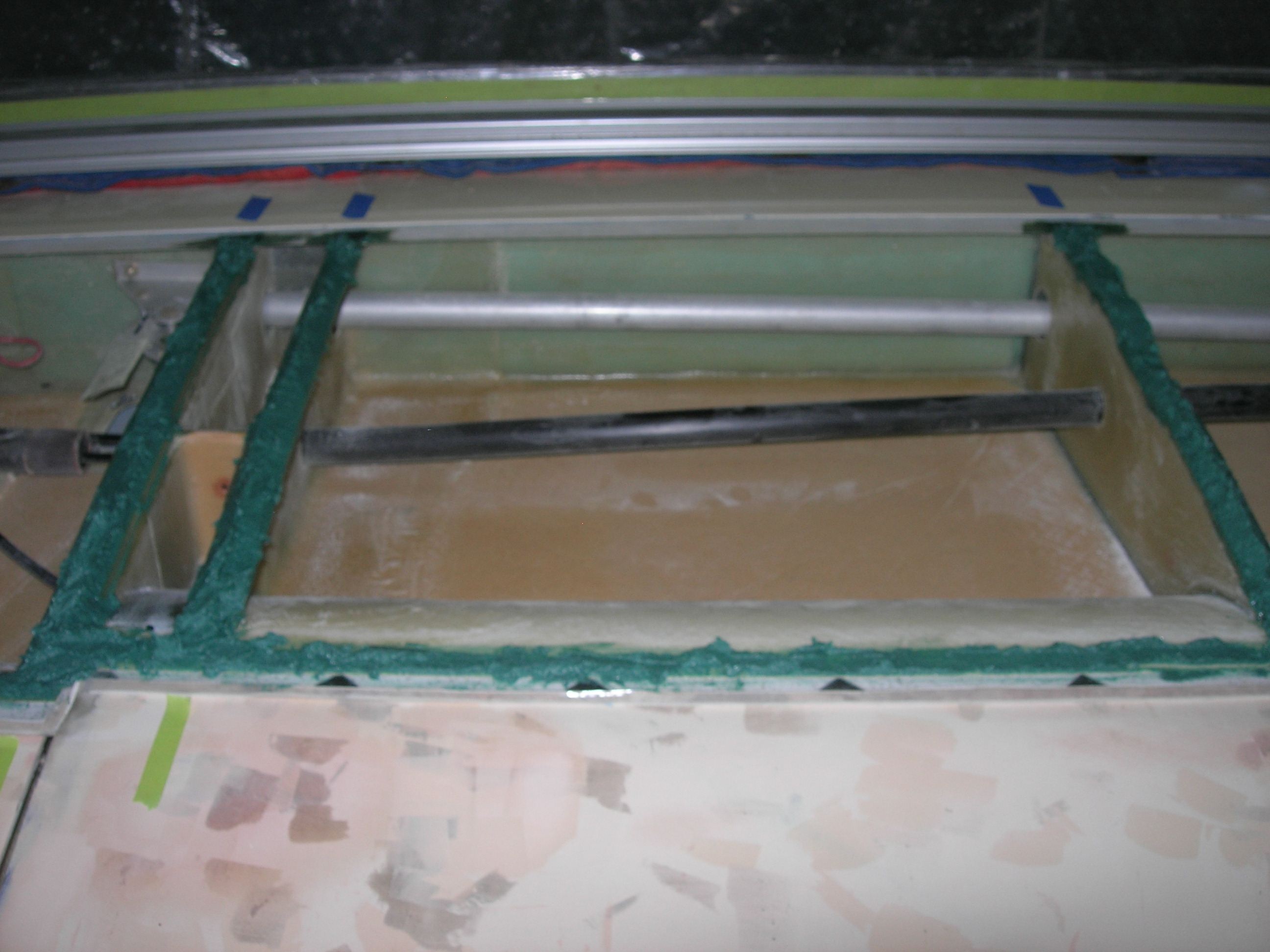 First pass of Port top wingskin bond on 7.